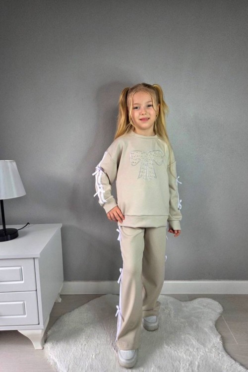 BAYRAMLIK İNCİLİ FİYONK KOLLARI VE PANTOLONU ŞERİTLİ İSPANYOL TAKIM Krem