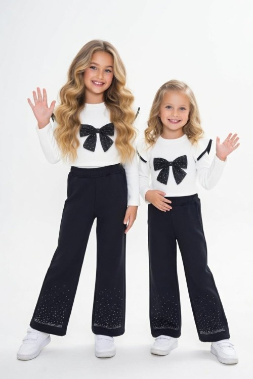 ÖNÜ SİYAH FİYONKLU PAÇA TAŞLI KOL FIRFIRLI İSPANYOL TAKIM Beyaz