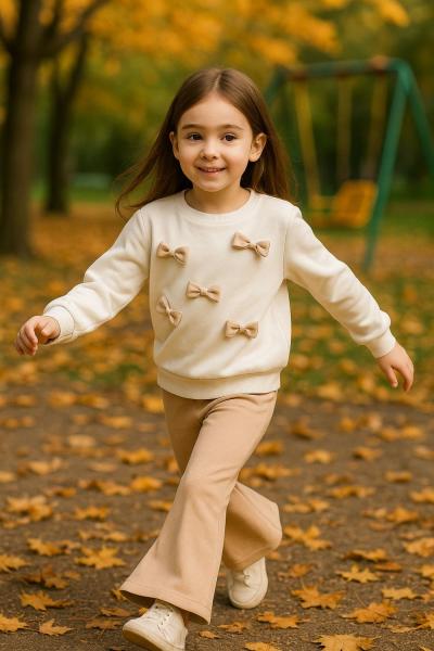 ÜZERİ MİNİK MİNİK FİYONKLU İKİ IP KIZ İSPANYOL TAKIM  Krem